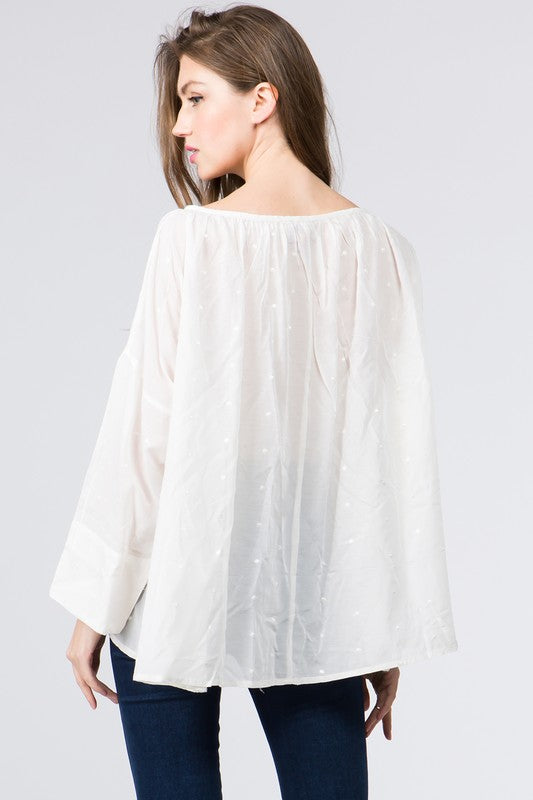 Nellie- not a care in the world in this loose cotton blouse